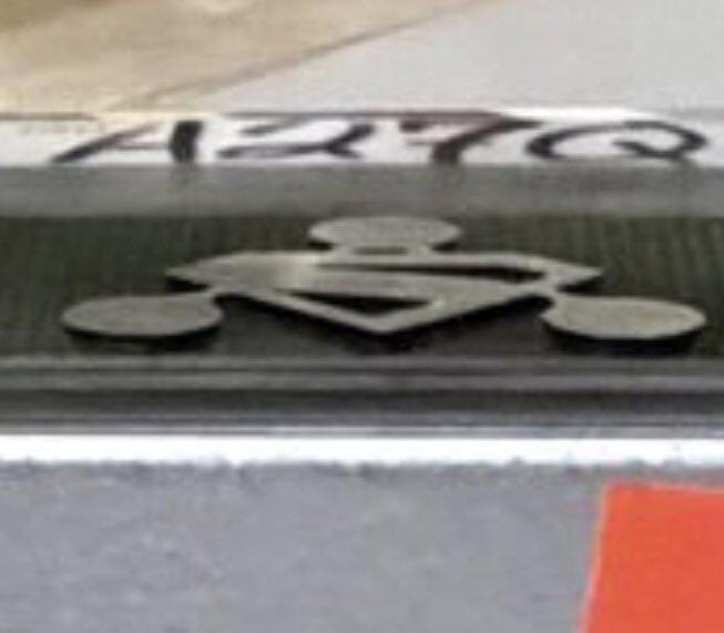 Superman and Brainiac Man of Tomorrow logo.