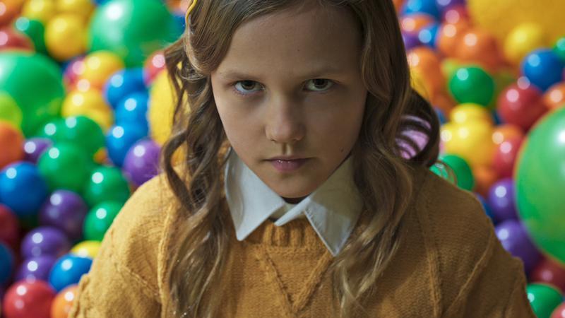 A menacing looking young girl in Hive.