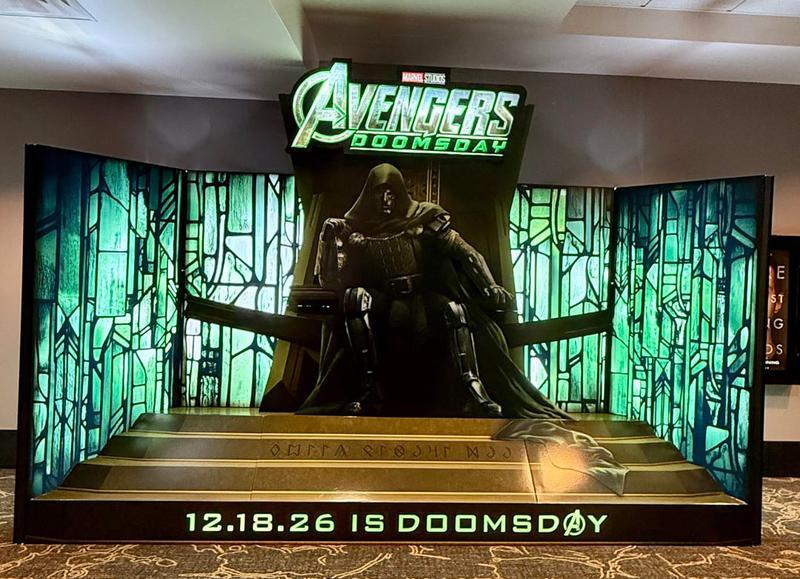 Avengers Doomsday theater standee, Doctor Doom siting on throne.
