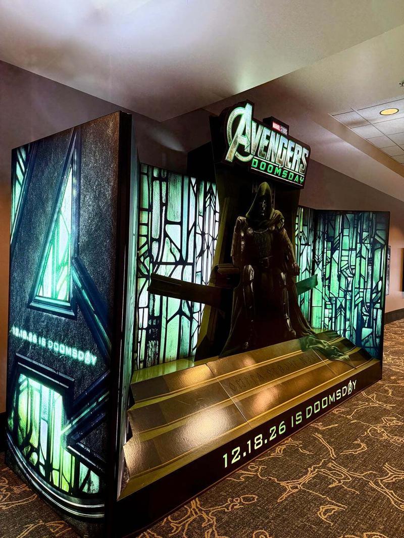 Avengers Doomsday theater standee, Doctor Doom sitting on throne, left side angle.