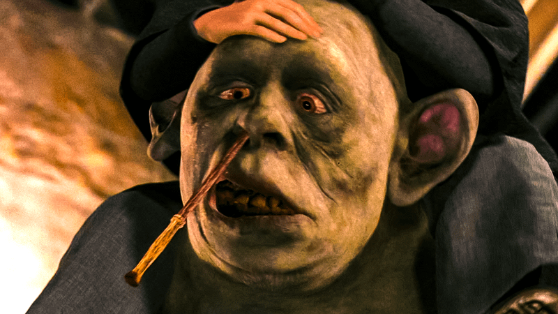 Harry Potter and the Philosopher's Stone troll, wand in nose.