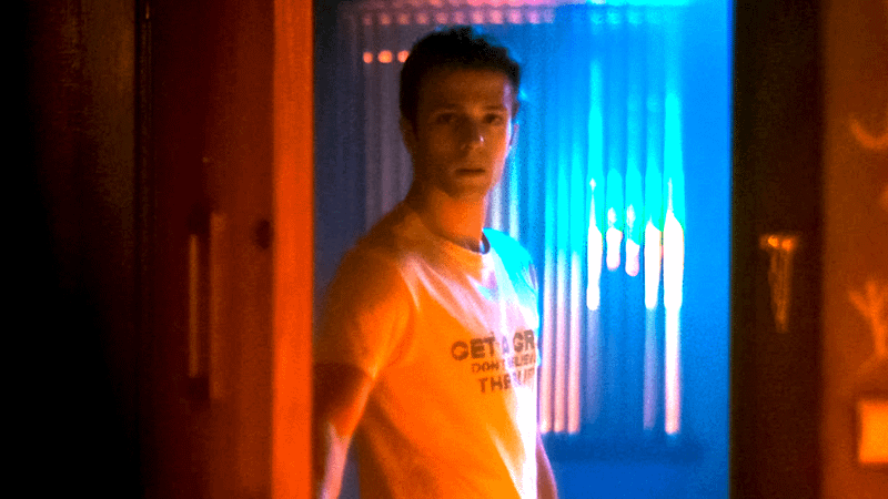 Tommy Maximoff opening a door in VisionQuest