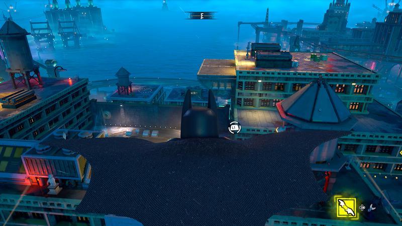 LEGO Batman gliding over Gotham City.