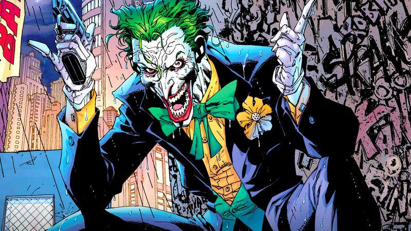 Joker holding out a gun in DC Comics
