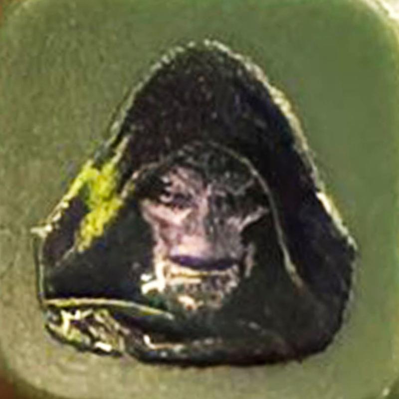 Doctor Doom's mask art from Avengers: Doomsday keychain.