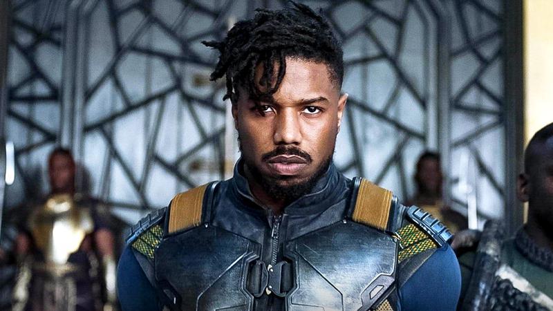 Michael B Jordan as Killmonger standing in a throne room in Black Panther