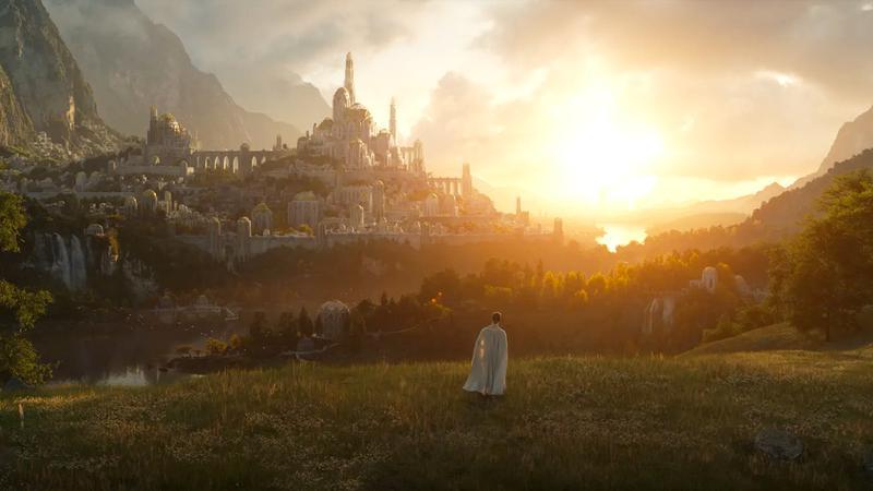 An elf looking at a large castle in Lord of the Rings