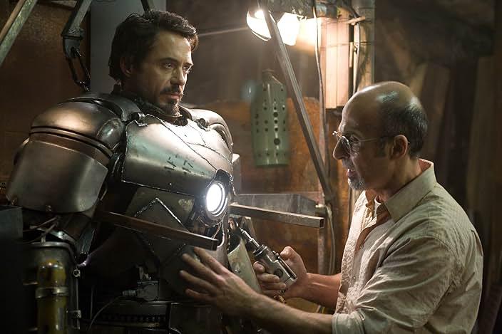 Tony Stark and Ho Yinsen building the first Ironman Suit in cave in Afghanistan