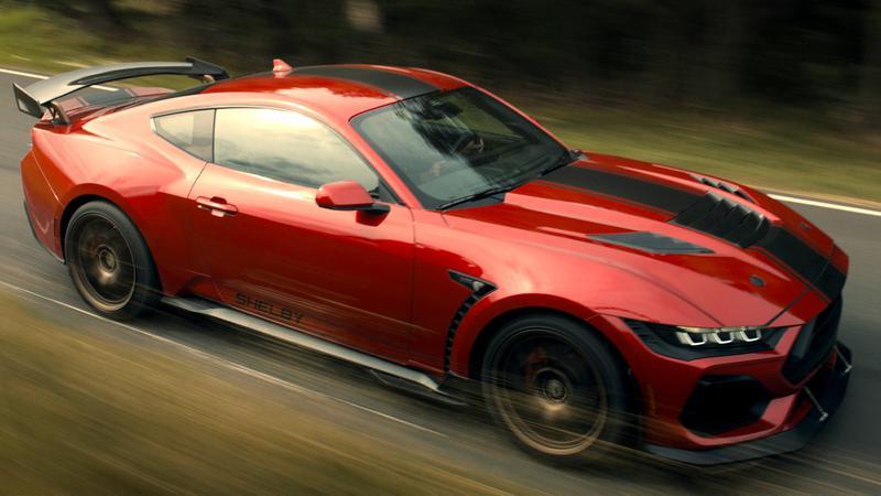 A red Ford Mustang Shelby Super Snake Mongoose.