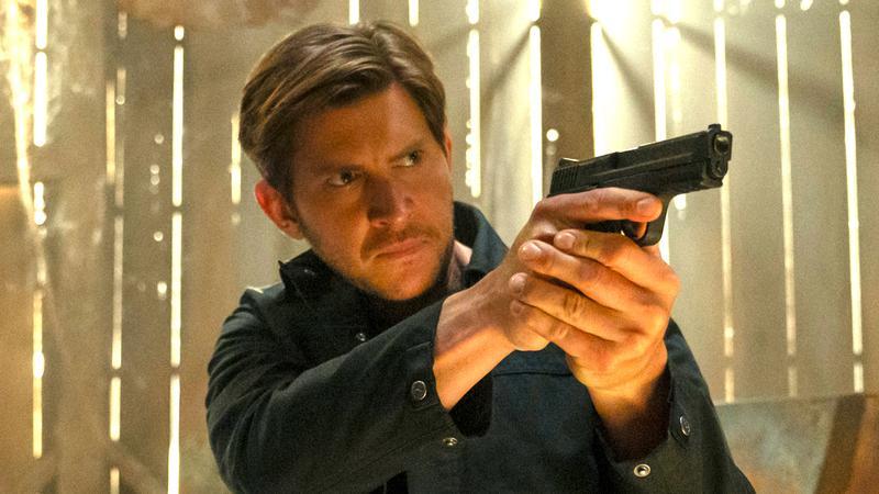 Greyston Holt as Detective Hudson Riley.