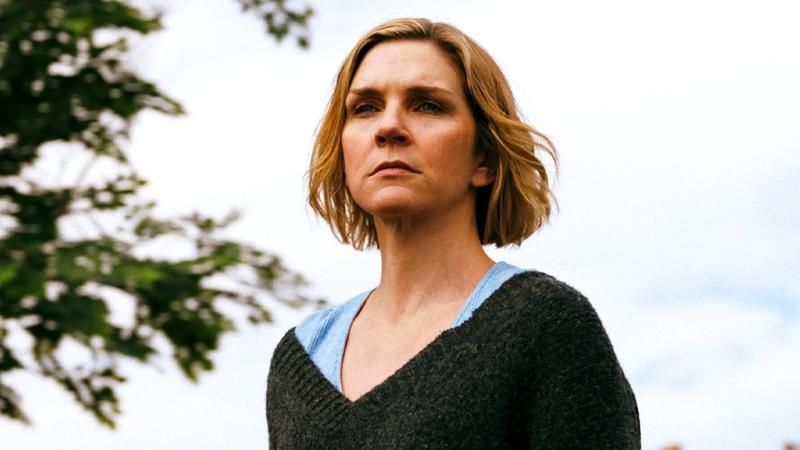Rhea Seehorn as Carol looking at the horizon in Pluribus