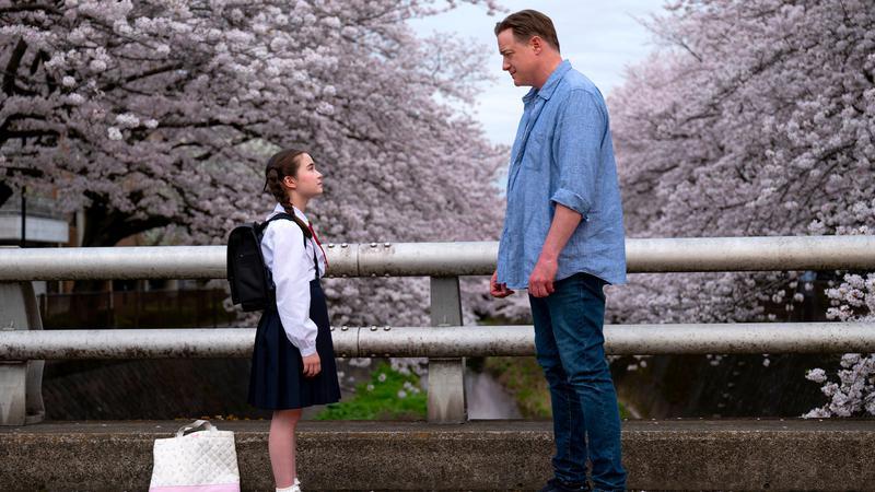 Mia and Phillip having a chat on a bridge
