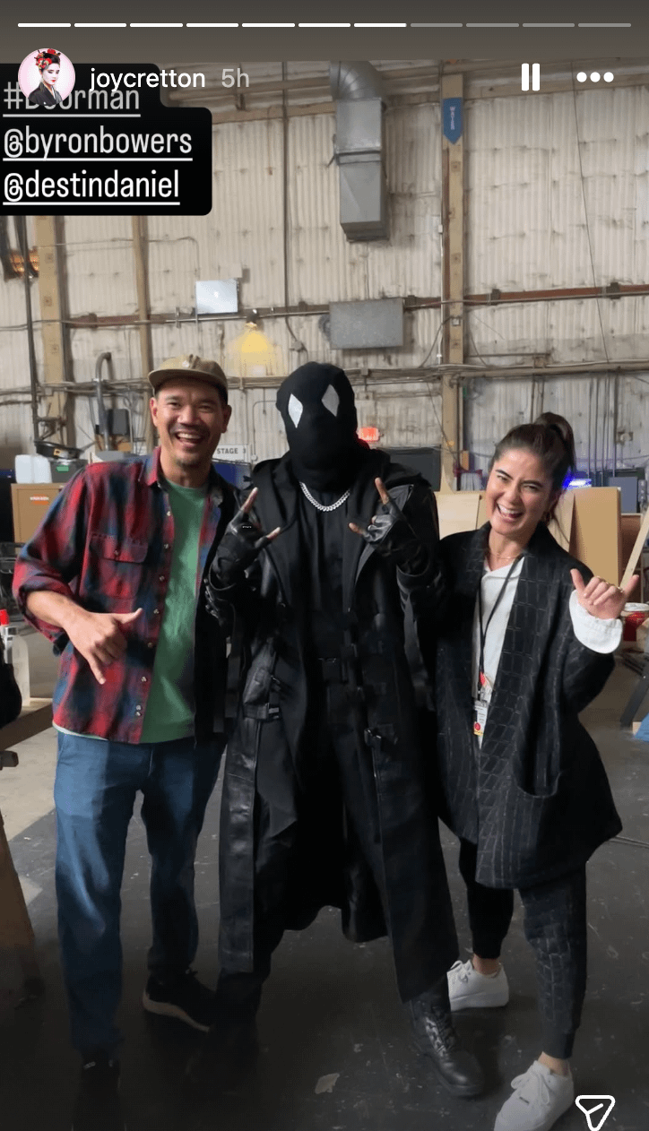 Crew standing with Doorman in full costume.