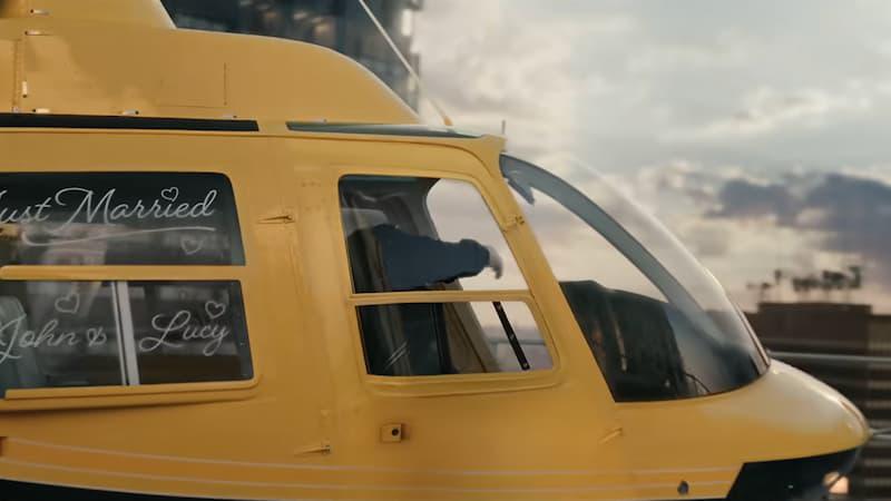 Helicopter with bride and groom's names written on the window.