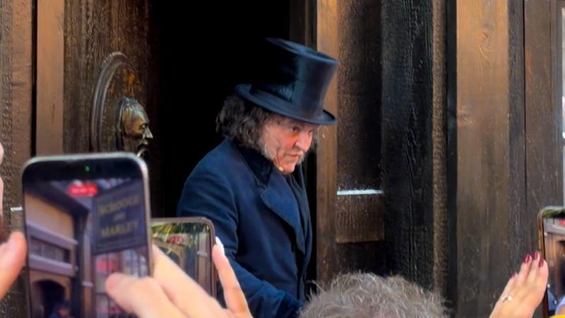 Johnny Depp as Ebeneezer Scrooge.