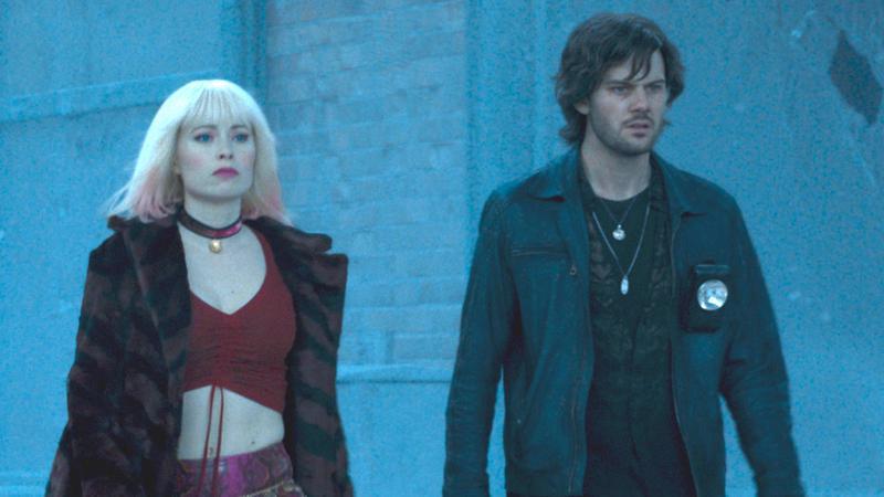 Hannah Emily Anderson and Jeremy Irvine walking across Silent Hill in Return to Silent Hill