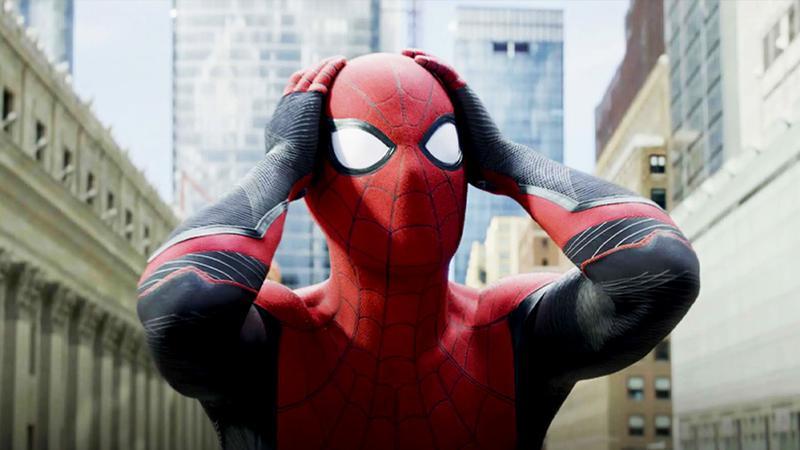 Tom Holland as Spider-Man holding his hands on his head in Spider-Man: Far From Home