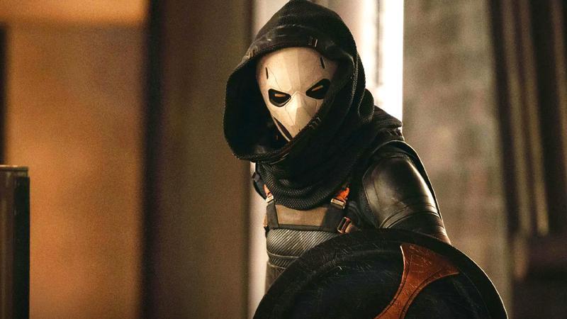 Olga Kurylenko as Taskmaster holding up a shield in a mask in Thunderbolts*
