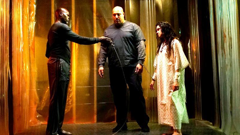 Djimon Hounsou and Lauren LeVera having a standoff in Twisted.