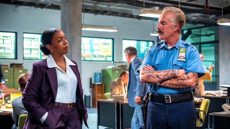 Titus Welliver (Glenn Keenan) and Jessica Frances Dukes (Birdie Polk) talking in Westies.