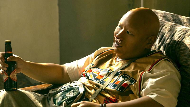 Jacob Batalon drinking as Pike in The Wrecking Crew.