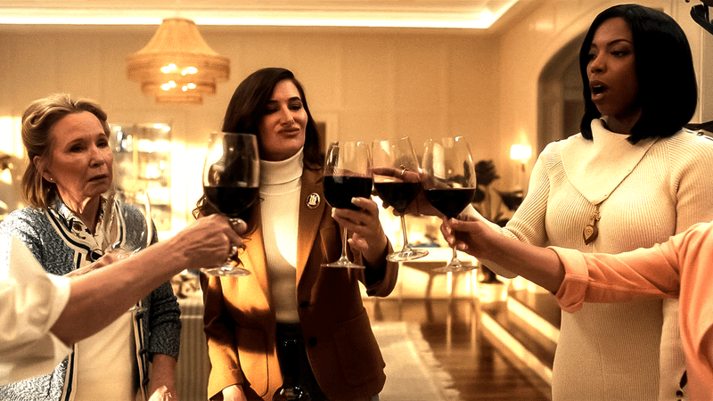 Characters drinking wine in Agatha All Along.
