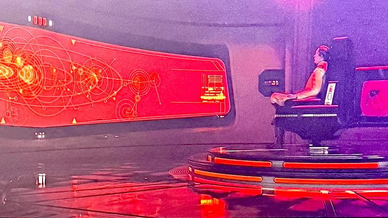 Grand Admiral Thrawn in a command room, analyzing a screen.