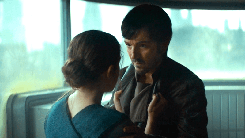Diego Luna as Cassian Andor being talked to by Elizabeth Dulau as Kleya in Andor