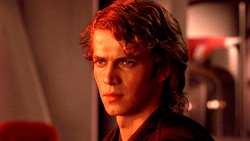 Hayden Christensen as Anakin with red light on his face in Revenge of the Sith