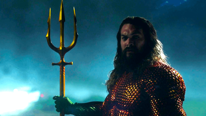 Jason Momoa as Aquaman standing with a trident in his hand in Peacemaker Season 1