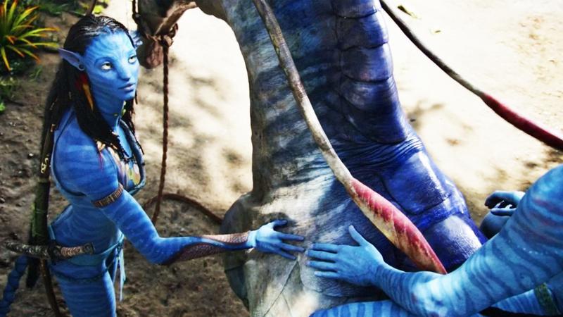 Neytiri putting her hand on a alien horse in Avatar