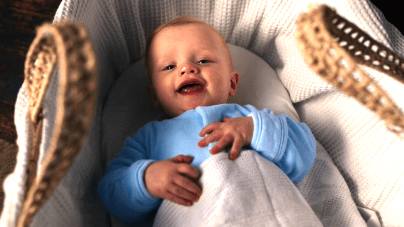 the baby looking at the camera in Man vs Baby 