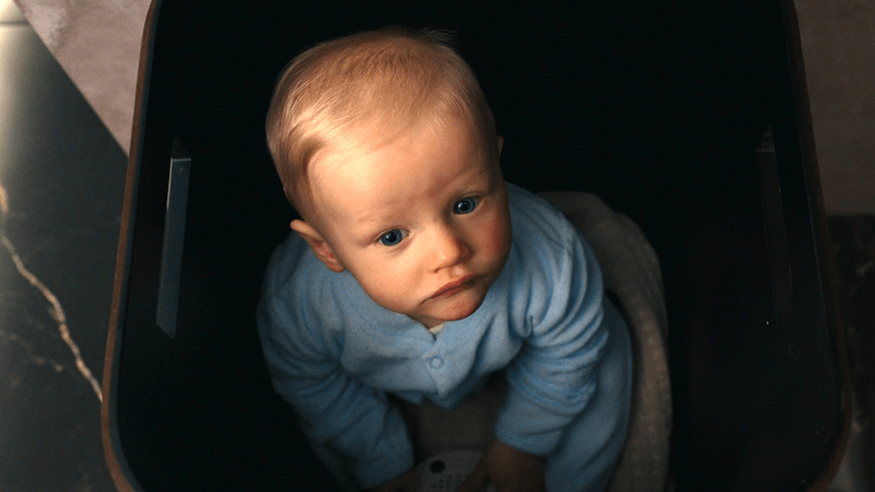 The baby looking at the camera in Man vs. Baby 