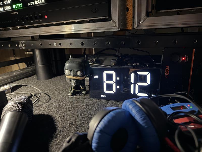 Matt Reeves The Batman Part 2 set photo Batman Funko Pop 8:12 clock.