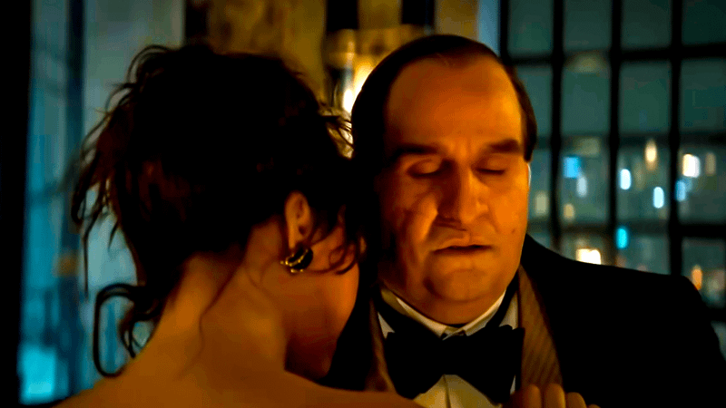 Oz Cobb dancing with his lover Eve Karlo.
