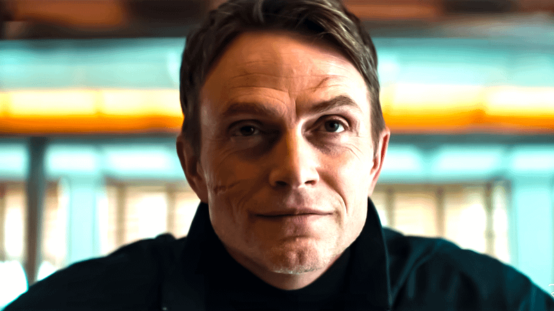 Wilson Bethel's Dex Poindexter looking at someone in Daredevil: Born Again.