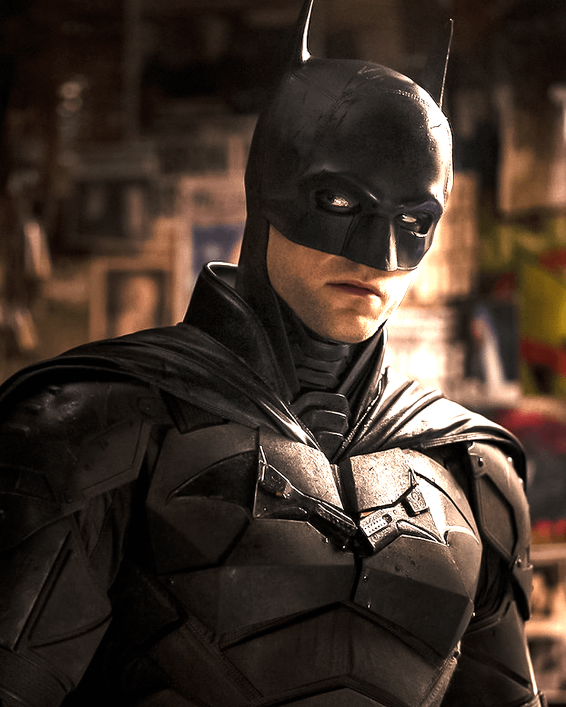Batman makes a menacing side-eye gesture.
