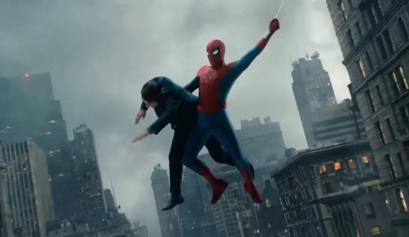 Spider-Man swinging with a criminal under his arm in 'Spider-Man: Brand New Day.'