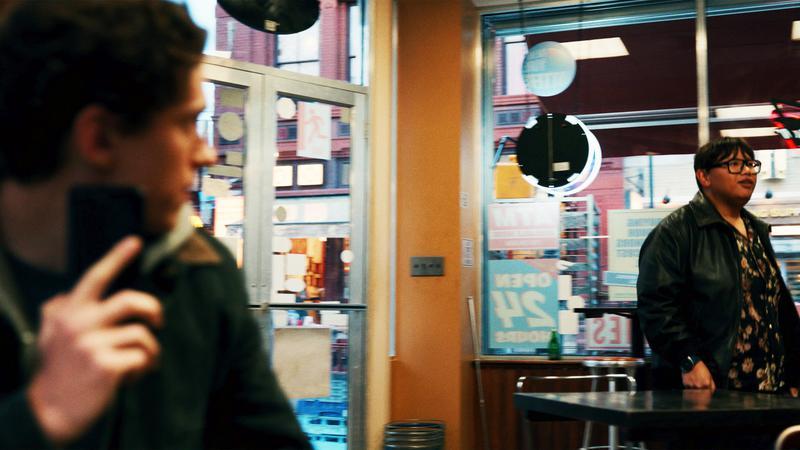 Peter Parker seeing Ned in a cafe.