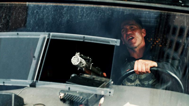 The Punisher's gun webbed up by Spider-Man.