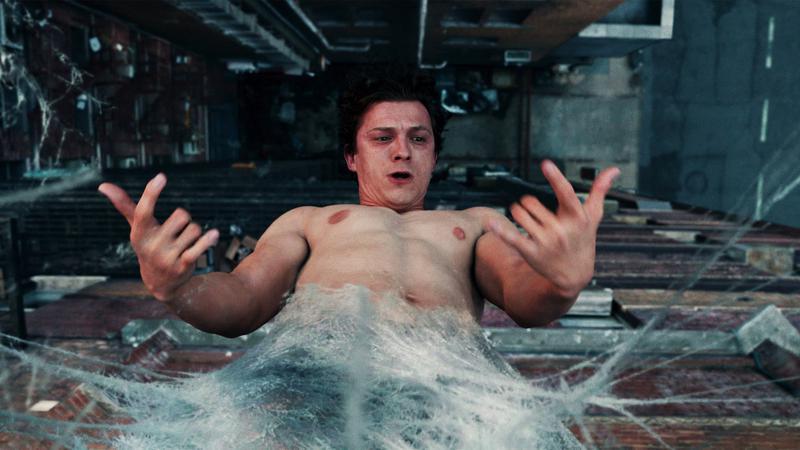 Peter Parker all webbed up on the outside of his apartment.