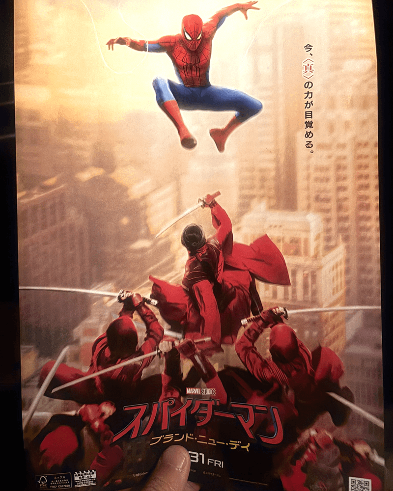 Spider-Man jumps over members of The Hand.