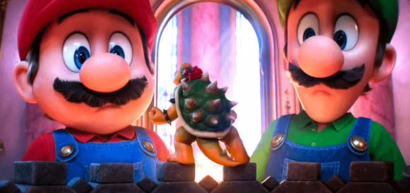 Mario and Luigi look at a small Boswer in The Super Mario Galaxy Movie