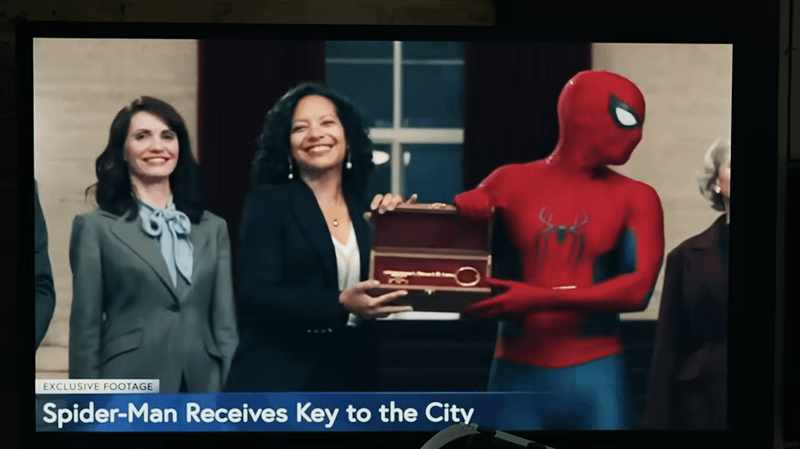 Zabryna Guerrera as Sheila Rivera, Tom Holland as Spider-Man getting a key to the city in 'Spider-Man: Brand New Day.'