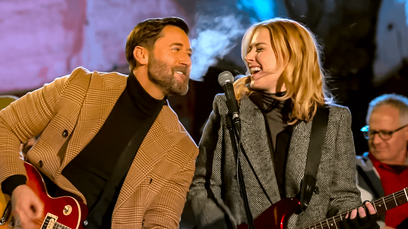 Alexandra Breckenridge as Taylor Jacobsen singing with Ryan Eggold's Matthew Layne in My Secret Santa