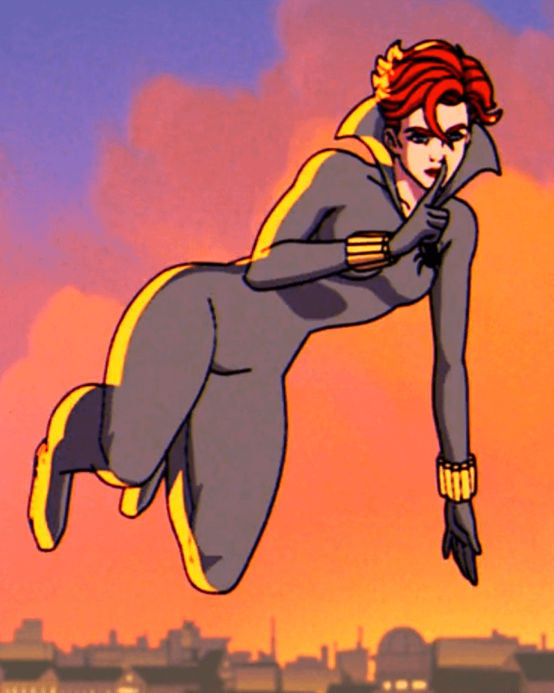 Natasha Romanoff holds her finger against her lips.