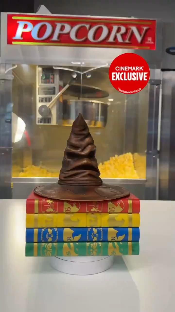Cinemark, Harry Potter popcorn bucket, sorting hat and books.