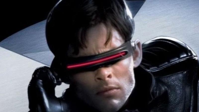 Cyclops touching his visor in X-Men.