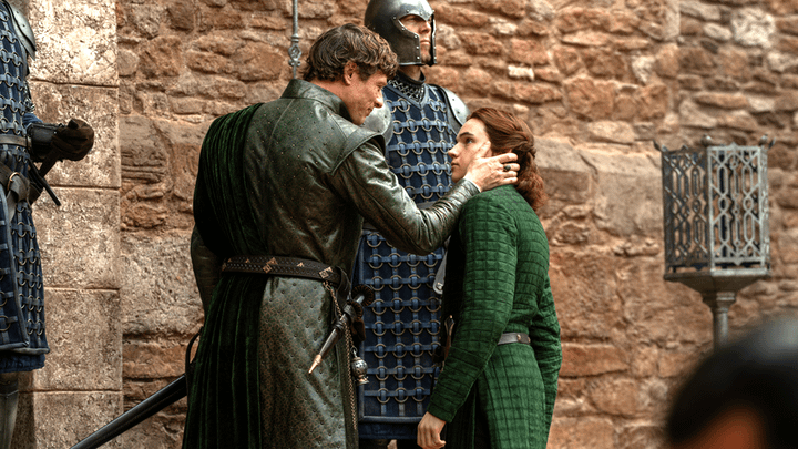 Ormund Hightower with his hand on Daeron Targaryen's face in House of the Dragon.