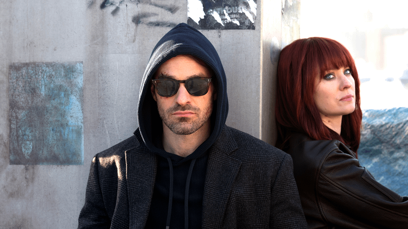 Charlie Cox as Matt Murdock in a pair of glasses next to Deborah Ann Woll in Daredevil: Born Again